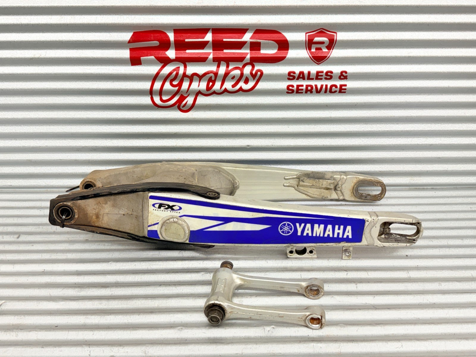 2004 Yamaha YZ250F Rear Swing Arm OEM 5UN-22110-00-00 5XE-2217F-00-00