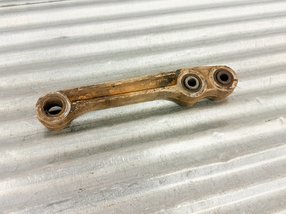 1999-2004 Honda TRX400EX OEM Rear Shock Linkage Cushion Arm 52465-HN1-000