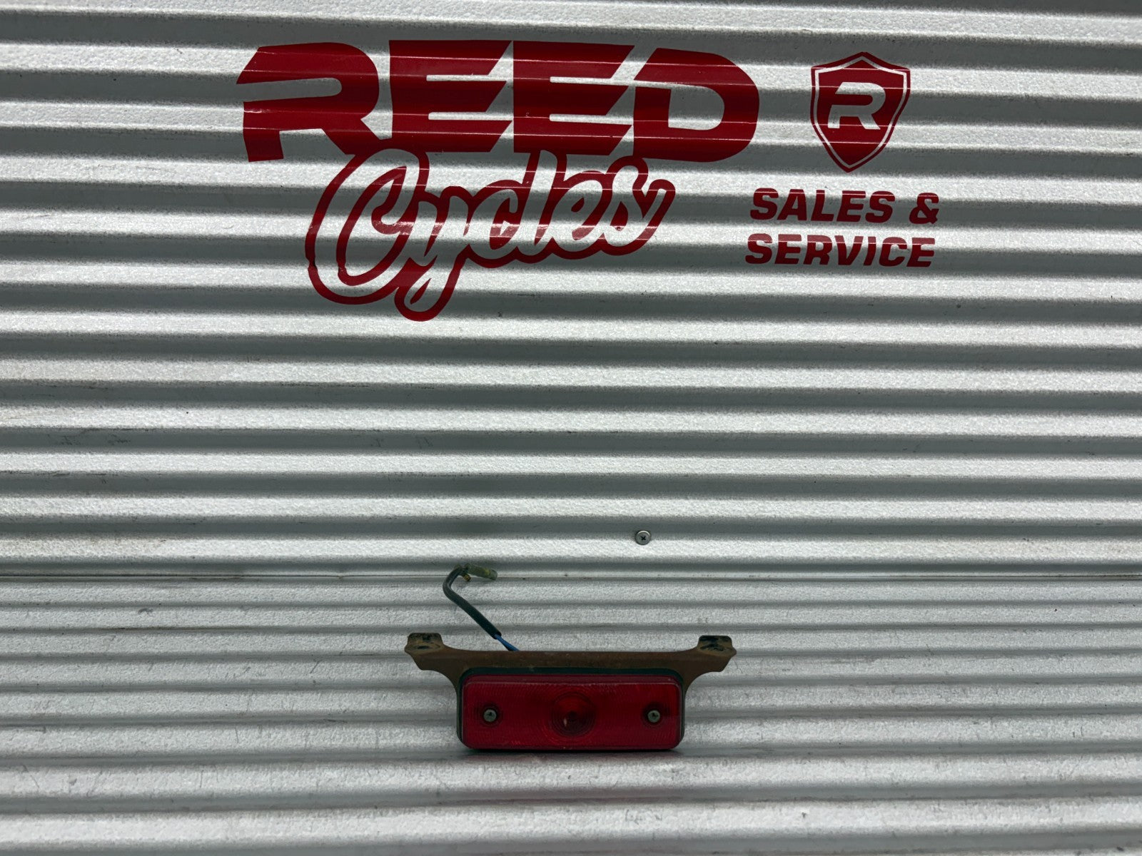 2000 Yamaha Blaster YFS200 Taillight with Mounting Bracket OEM 38W-84710-00-00