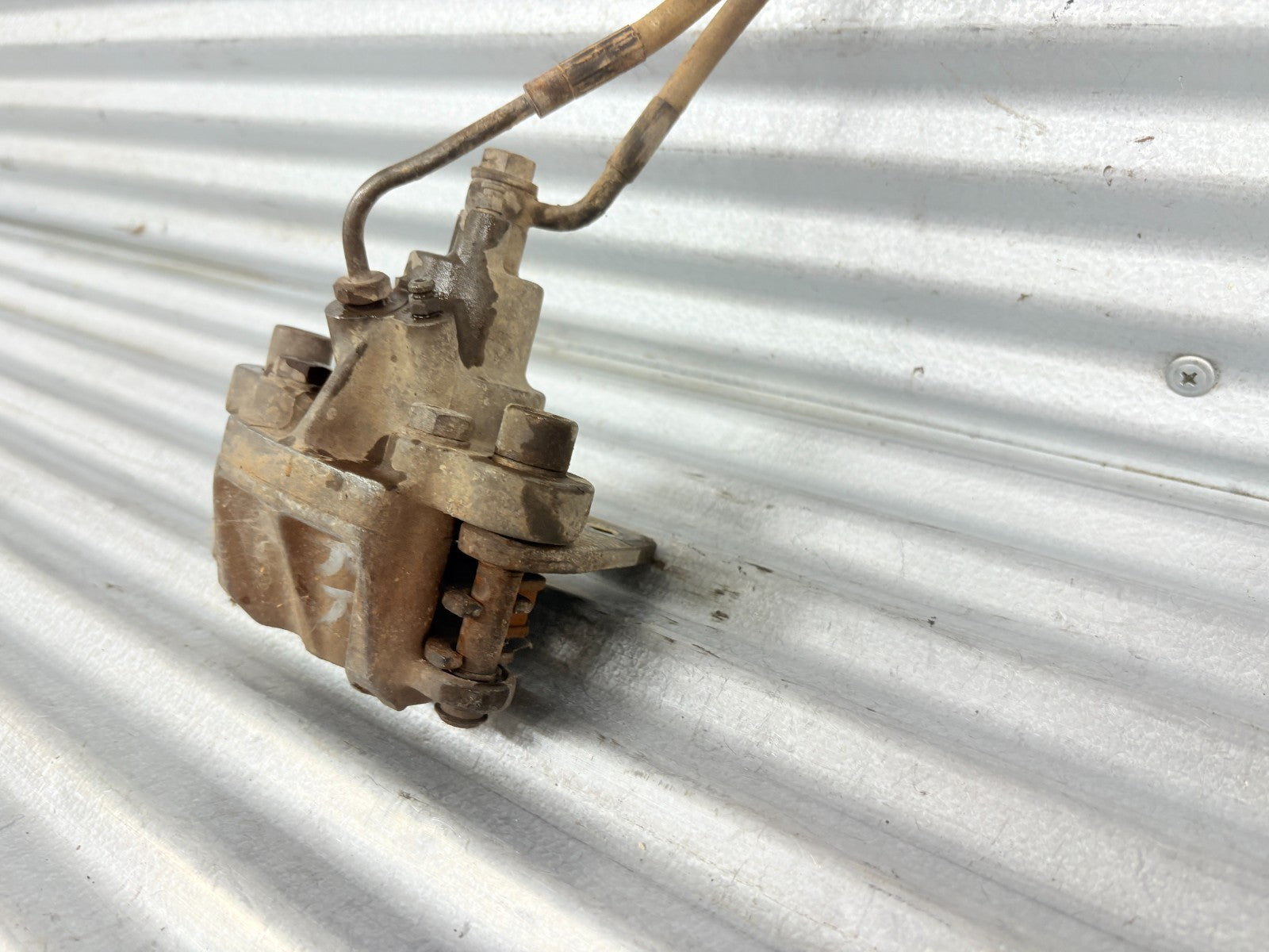 2002 Polaris Sportsman 700 Rear Brake Caliper OEM 1910455