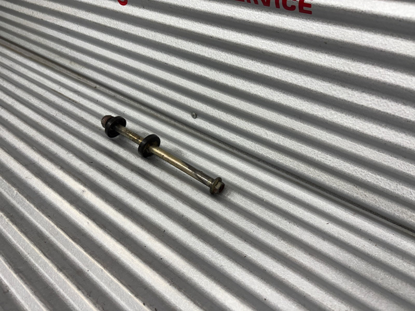 1986 Honda XL 600R Swingarm Pivot Bolt With Caps OEM 90121-MG3-000