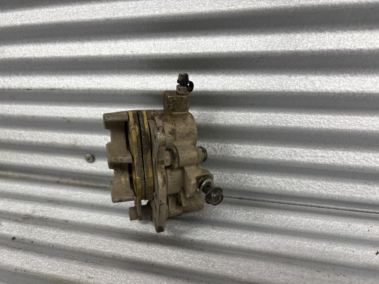 2010 Kawasaki Teryx 750 Left Front Brake Caliper OEM 43080-0083