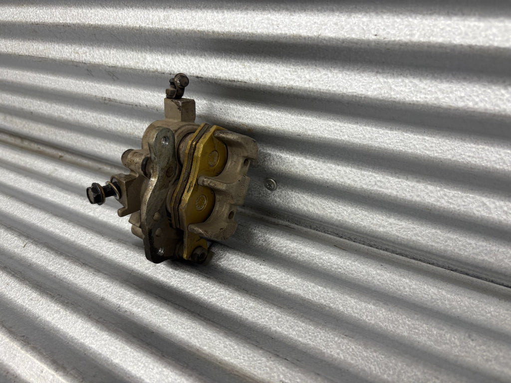 2010 Kawasaki Teryx 750 Left Front Brake Caliper OEM 43080-0083