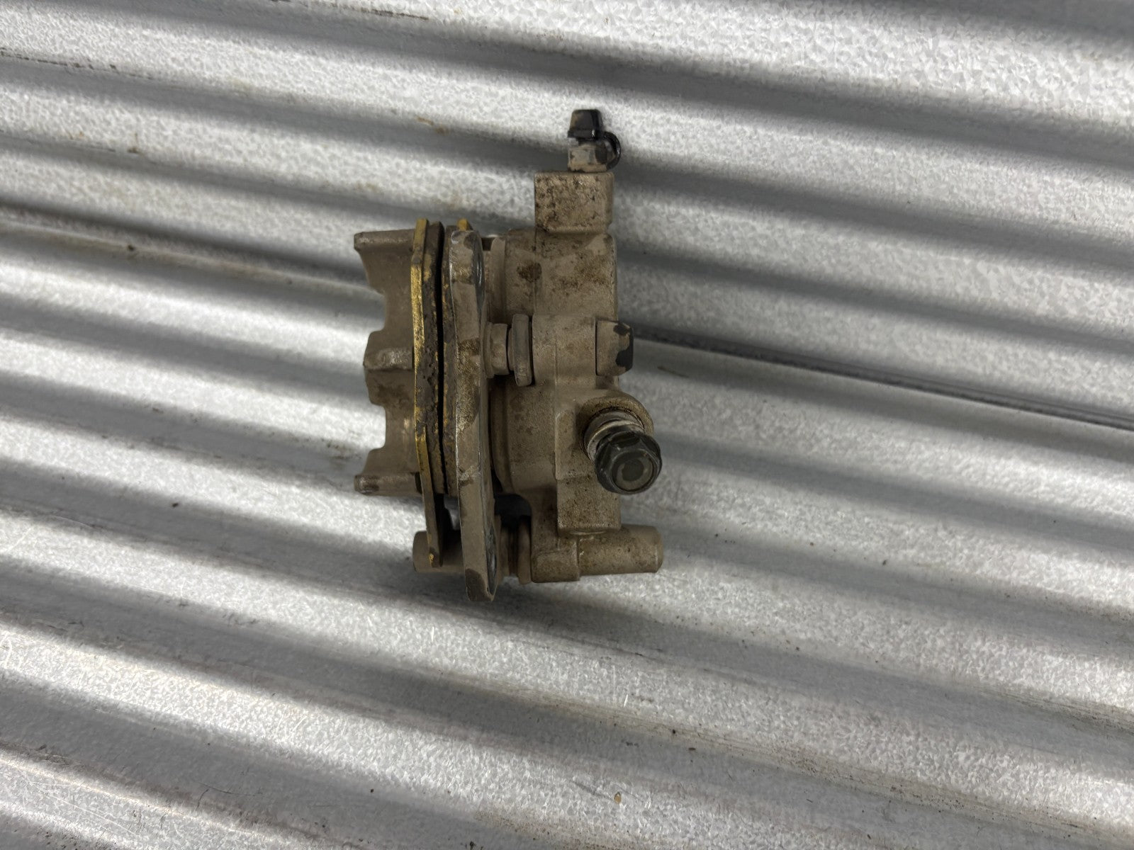 2010 Kawasaki Teryx 750 Left Front Brake Caliper OEM 43080-0083