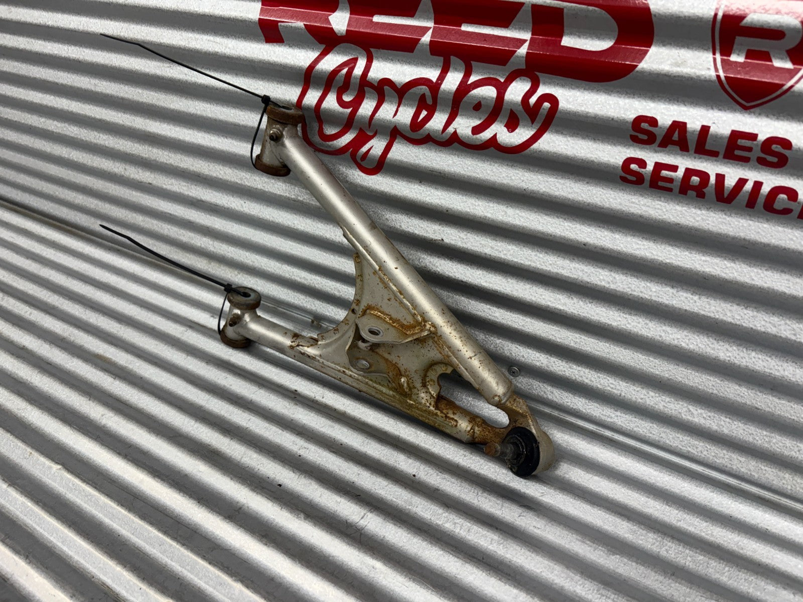 2000 Yamaha Blaster YFS200 Front Left Lower A-Arm OEM 3JM-23570-00-35