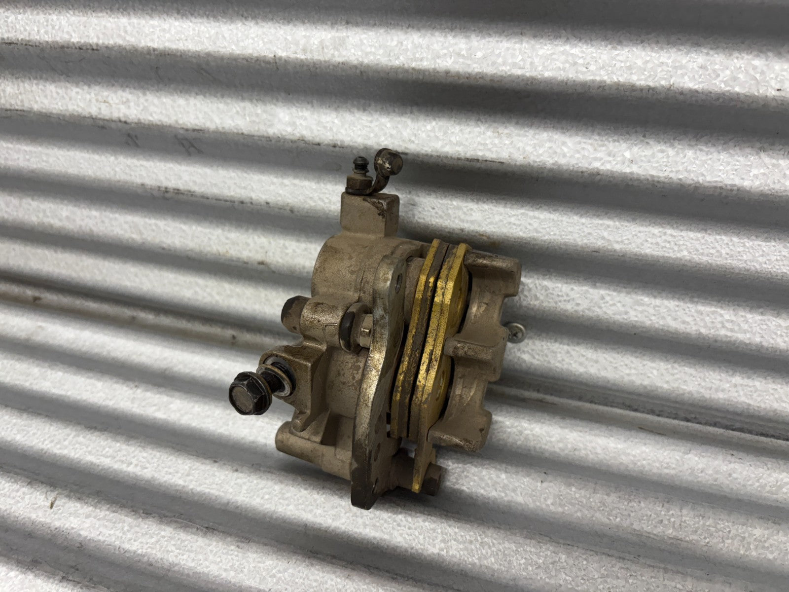 2010 Kawasaki Teryx 750 Left Front Brake Caliper OEM 43080-0083