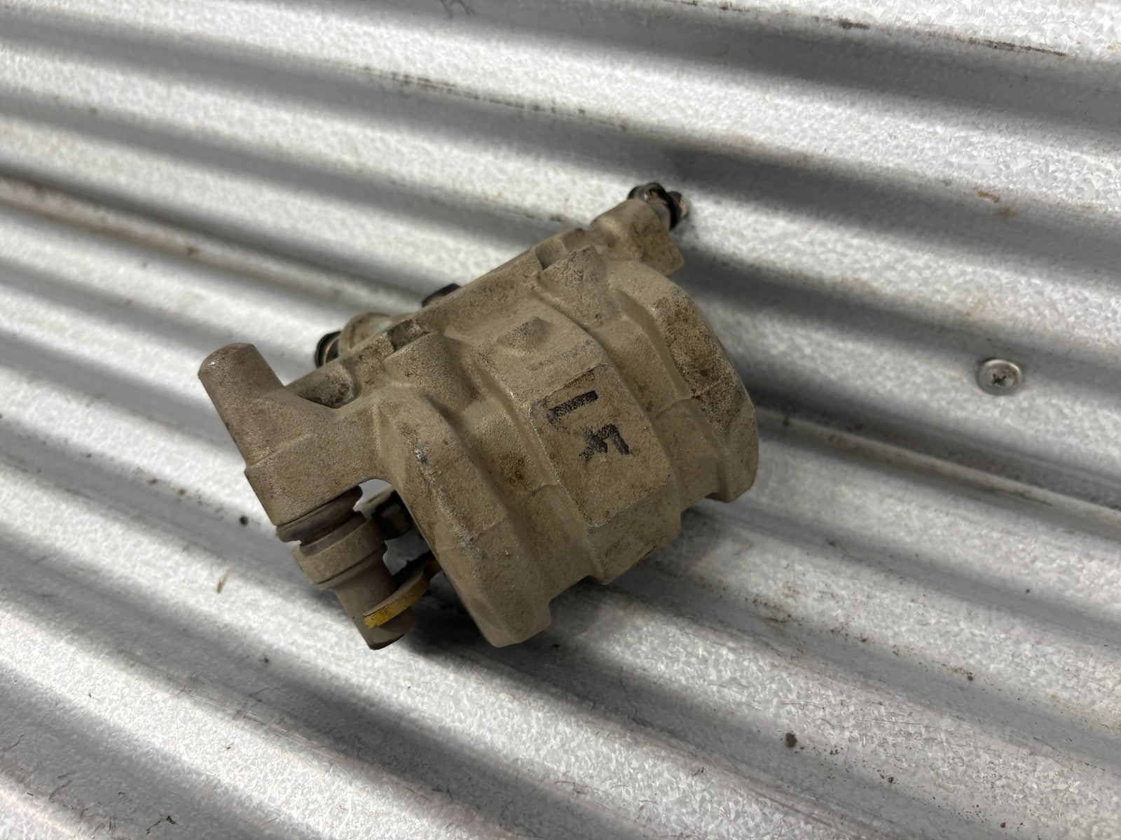 2010 Kawasaki Teryx 750 Left Front Brake Caliper OEM 43080-0083