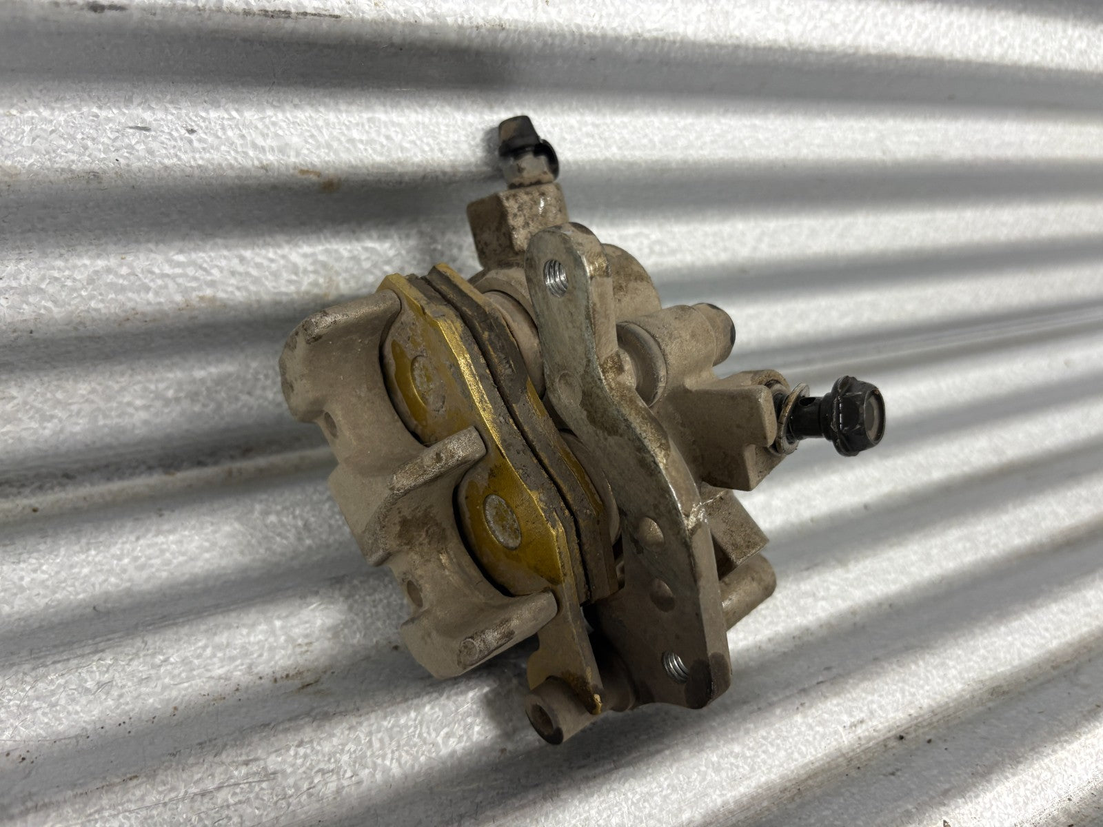 2010 Kawasaki Teryx 750 Left Front Brake Caliper OEM 43080-0083