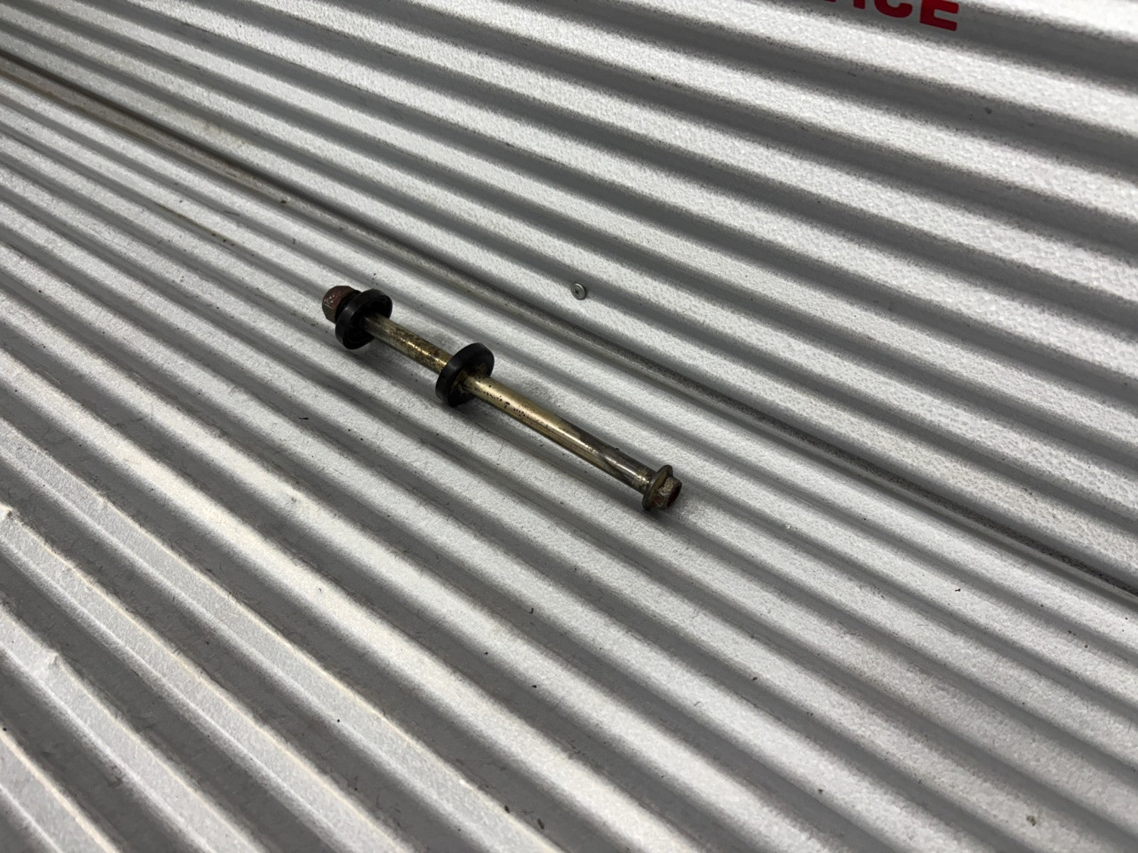 1986 Honda XL 600R Swingarm Pivot Bolt With Caps OEM 90121-MG3-000