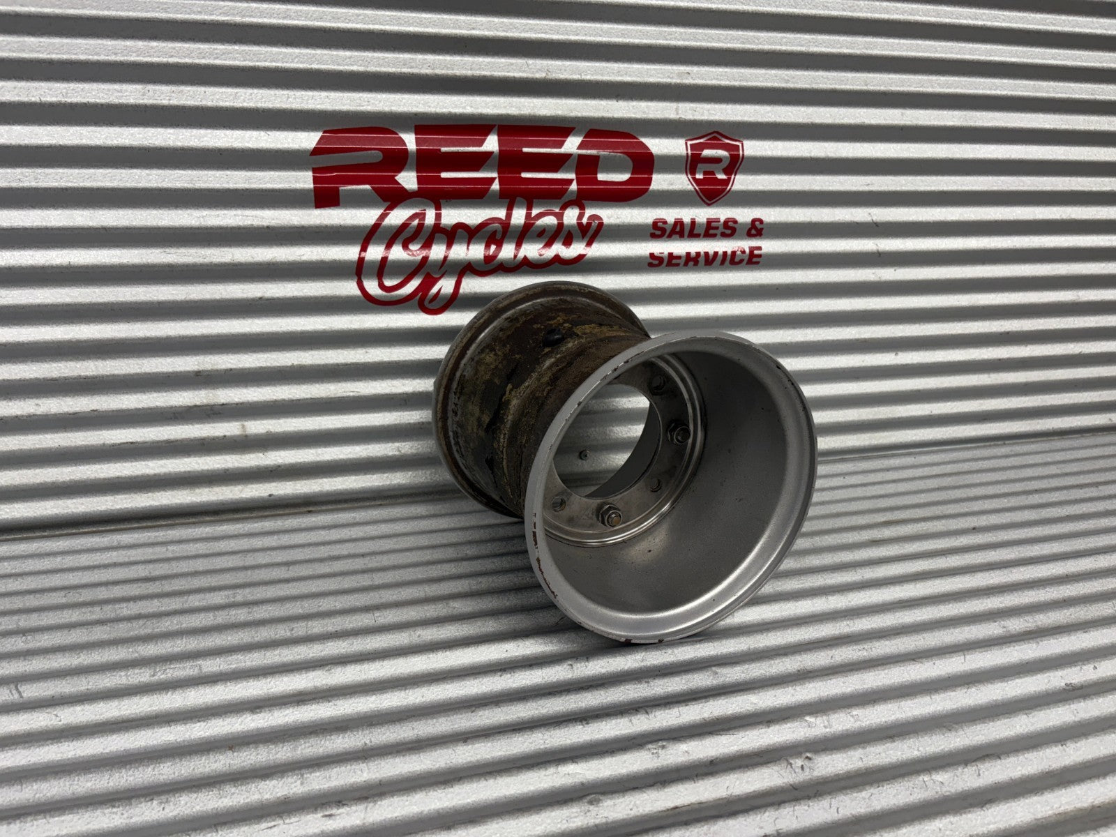 1985 Honda FourTrax TRX125 Rear Wheel OEM 42712-VM6-000 / 42713-VM6-000