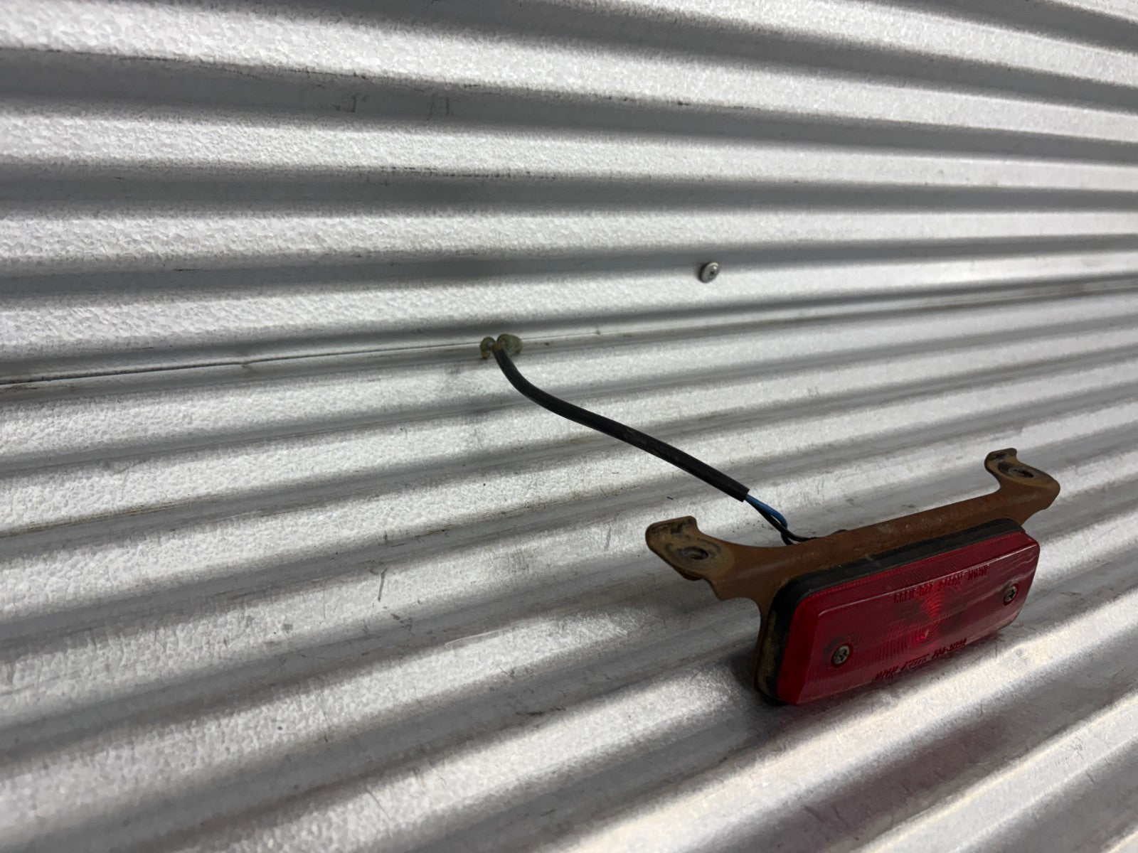 2000 Yamaha Blaster YFS200 Taillight with Mounting Bracket OEM 38W-84710-00-00