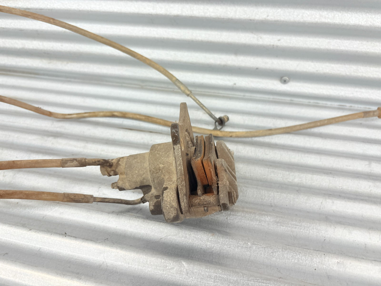 2002 Polaris Sportsman 700 Rear Brake Caliper OEM 1910455