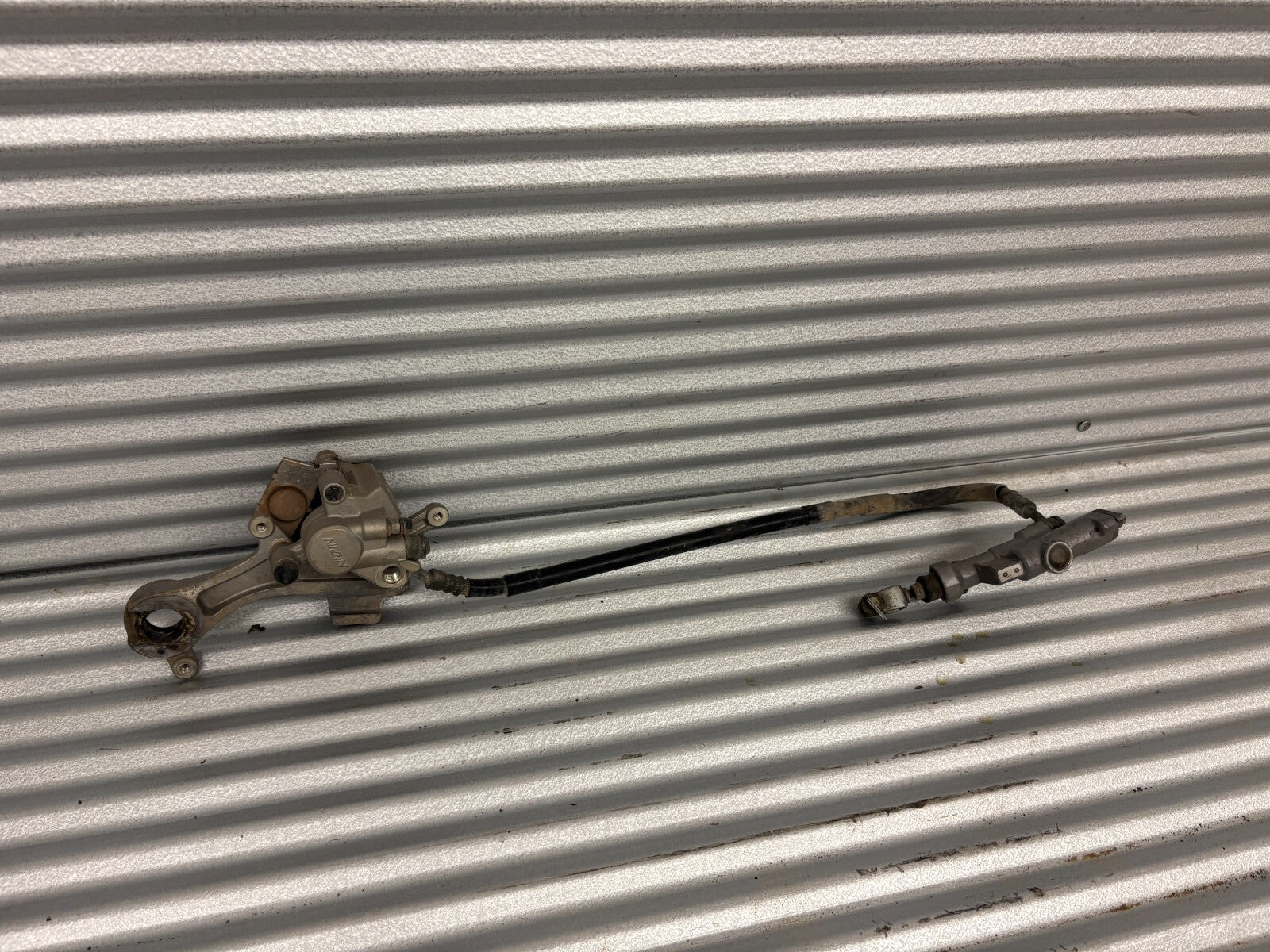 2004 Yamaha YZ250F Rear Brake Caliper OEM 5UN-2580V-00-00