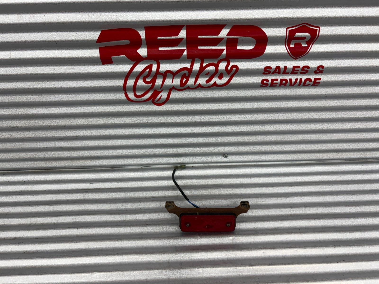 2000 Yamaha Blaster YFS200 Taillight with Mounting Bracket OEM 38W-84710-00-00