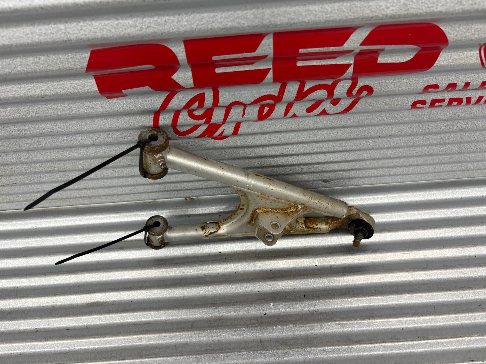 2000 Yamaha Blaster YFS200 Front Left Lower A-Arm OEM 3JM-23570-00-35