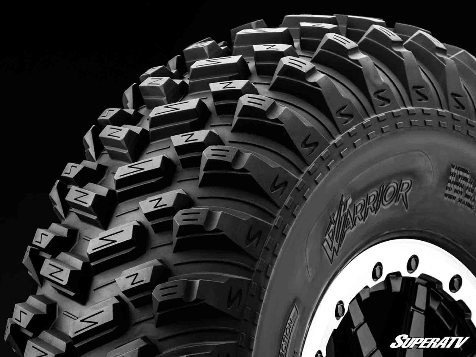 STANDARD XT WARRIOR TIRES 30X10X15 ON 15X10 ASSAULT INDUSTRIES HELLFIRE MATTE TITANIUM WHEELS 4/136 PATTERN