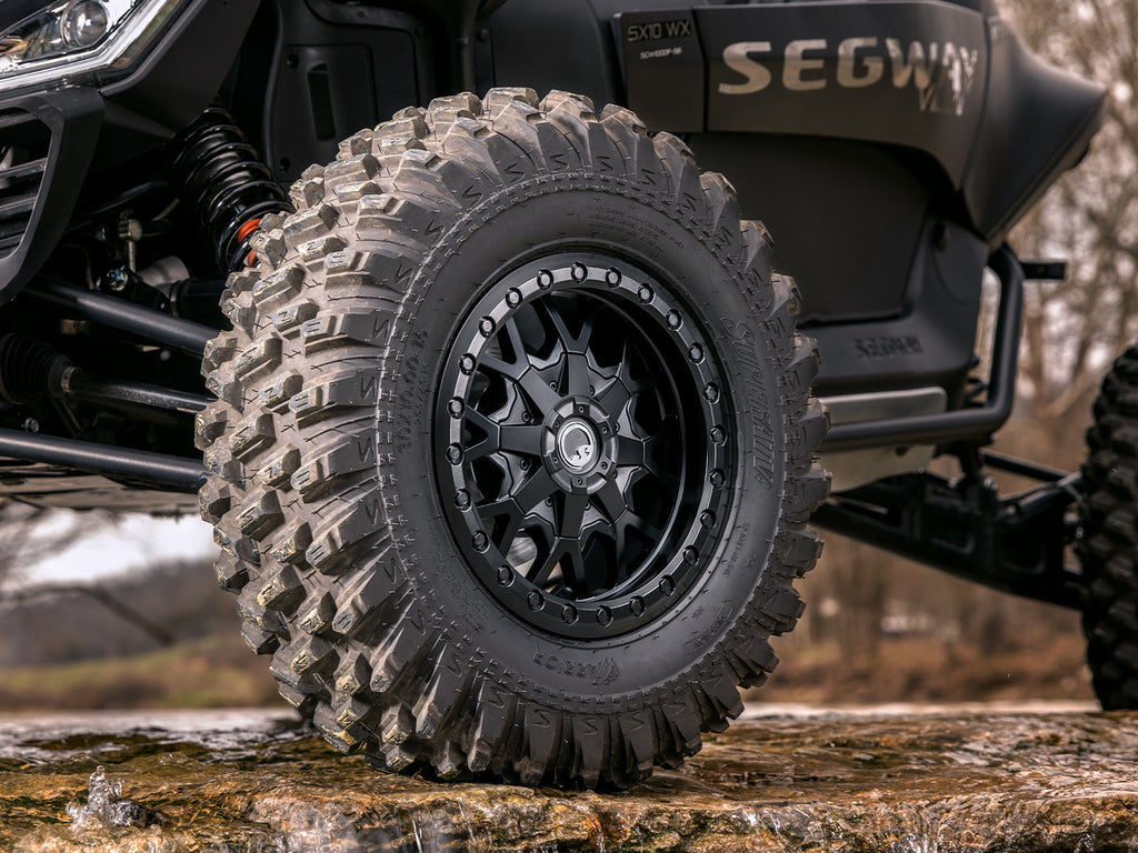 STANDARD XT WARRIOR TIRES 32X10X15 ON 15X7 ASSAULT INDUSTRIES HELLFIRE MATTE TITANIUM WHEELS 4/136 PATTERN