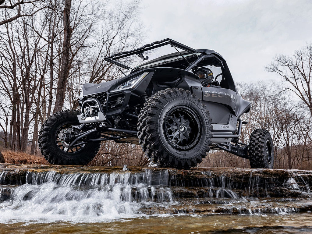 STANDARD XT WARRIOR TIRES 32X10X15 ON 15X7 ASSAULT INDUSTRIES HELLFIRE MATTE TITANIUM WHEELS 4/136 PATTERN
